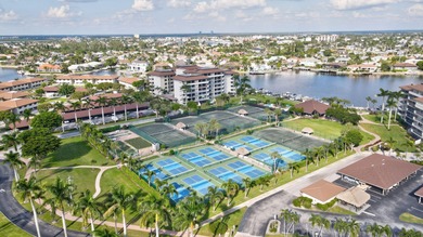 Indulge in luxury coastal living with this bright and - photo 51
