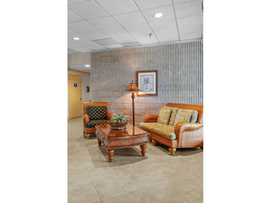 Indulge in luxury coastal living with this bright and - photo 60