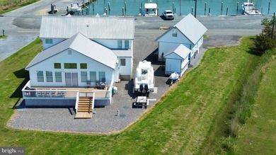 Enjoy waterfront living in this updated 4 bedroom, 2 bath - photo 11