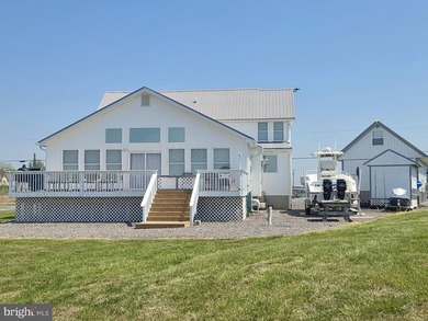 Enjoy waterfront living in this updated 4 bedroom, 2 bath - photo 12