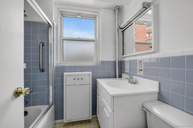 Welcome to this spacious and inviting 2-bedroom, 1-bath co-op - photo 13