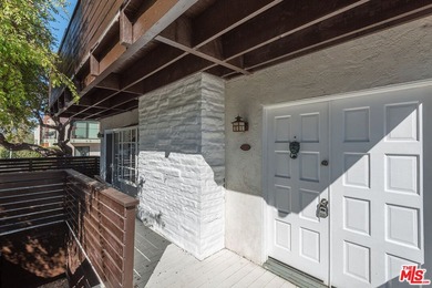 Just steps from the sand, this beautiful triplex sits on a prime - photo 7