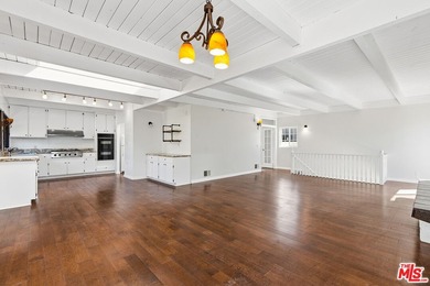 Just steps from the sand, this beautiful triplex sits on a prime - photo 8