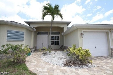This spacious 3-bedroom + den, 2-bath pool home comes with an - photo 1