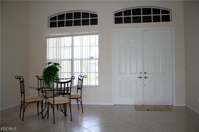 This spacious 3-bedroom + den, 2-bath pool home comes with an - photo 3