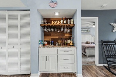 Escape to the beach and unwind in this beautifully remodeled - photo 14