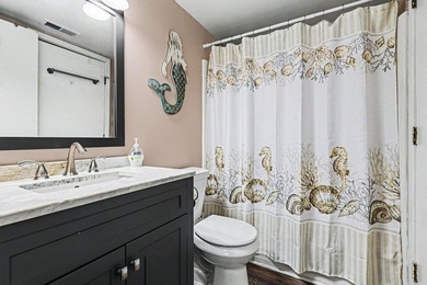 Escape to the beach and unwind in this beautifully remodeled - photo 21