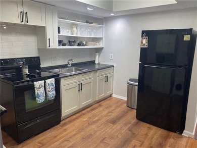 Welcome to Narragansett Village! This first-level condo features - photo 11
