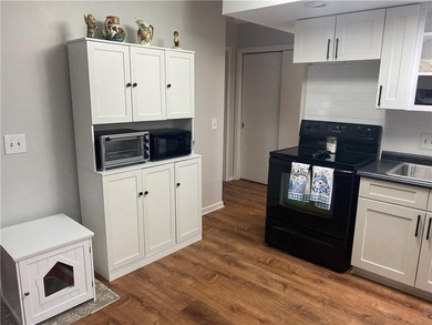 Welcome to Narragansett Village! This first-level condo features - photo 12