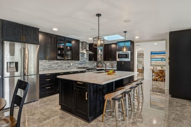 Experience unparalleled luxury in this exquisite, fully - photo 13