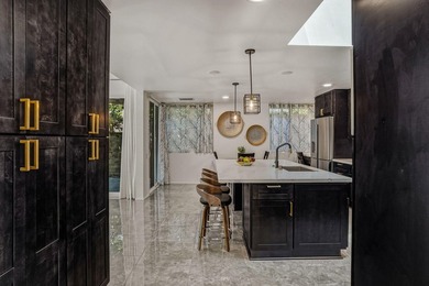 Experience unparalleled luxury in this exquisite, fully - photo 16