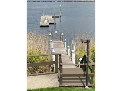 Welcome to Narragansett Village! This first-level condo features - photo 21