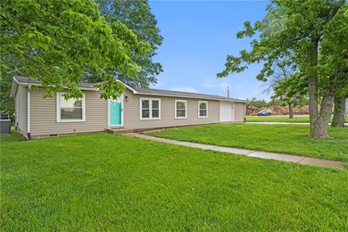 This beautifully remodeled ranch home, located in a gated - photo 2