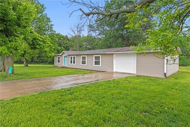 This beautifully remodeled ranch home, located in a gated - photo 3