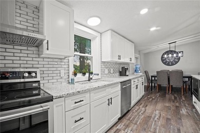 This beautifully remodeled ranch home, located in a gated - photo 9