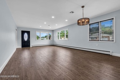 Welcome to 2 Ashcroft Lane, a charming 2-bed, 2-bath Lakeview - photo 2