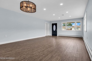 Welcome to 2 Ashcroft Lane, a charming 2-bed, 2-bath Lakeview - photo 4