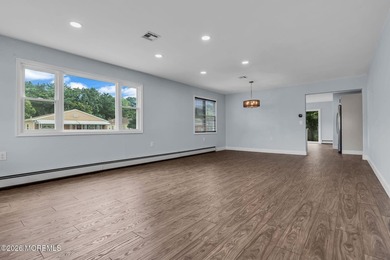 Welcome to 2 Ashcroft Lane, a charming 2-bed, 2-bath Lakeview - photo 5