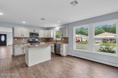 Welcome to 2 Ashcroft Lane, a charming 2-bed, 2-bath Lakeview - photo 9