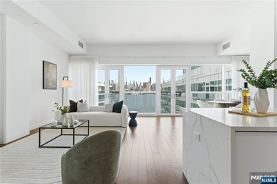 Enjoy waterfront living at its finest in Residence #1010 at - photo 1