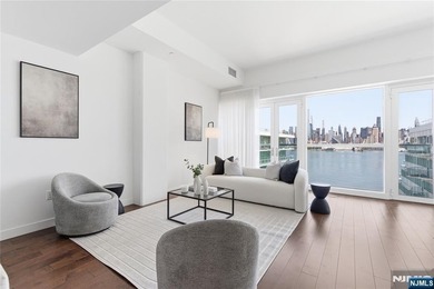 Enjoy waterfront living at its finest in Residence #1010 at - photo 3