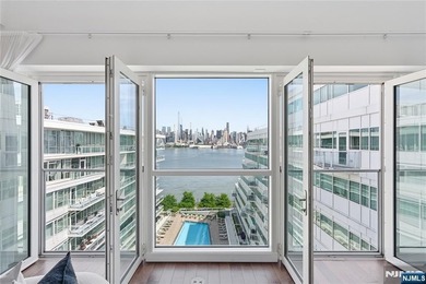 Enjoy waterfront living at its finest in Residence #1010 at - photo 8