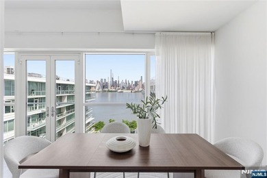 Enjoy waterfront living at its finest in Residence #1010 at - photo 10