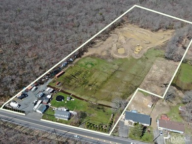The value is in the land. Amazing property with lots of - photo 1
