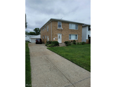 Charming Euclid Brick Duplex. The property at 535-537 E 208th St - photo 4