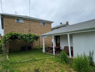Charming Euclid Brick Duplex. The property at 535-537 E 208th St - photo 6