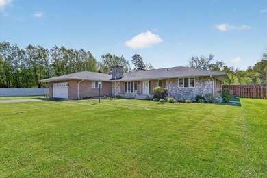 All-brick home offering space and comfort throughout! Features a - photo 1