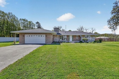 All-brick home offering space and comfort throughout! Features a - photo 2