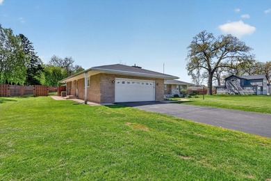 All-brick home offering space and comfort throughout! Features a - photo 4