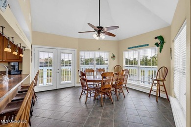 Located on a spacious waterfront lot in Bay St. Louis, this - photo 18