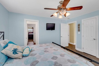 Located on a spacious waterfront lot in Bay St. Louis, this - photo 22