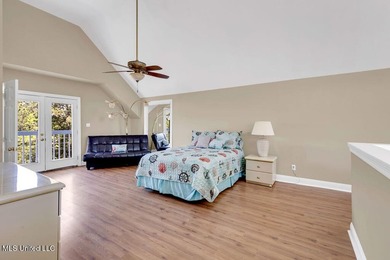 Located on a spacious waterfront lot in Bay St. Louis, this - photo 30