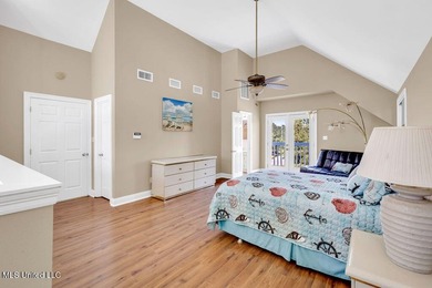 Located on a spacious waterfront lot in Bay St. Louis, this - photo 33