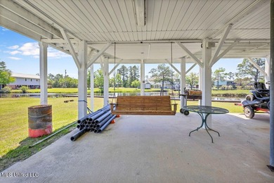 Located on a spacious waterfront lot in Bay St. Louis, this - photo 38