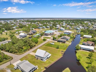 Located on a spacious waterfront lot in Bay St. Louis, this - photo 40