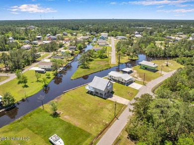 Located on a spacious waterfront lot in Bay St. Louis, this - photo 42