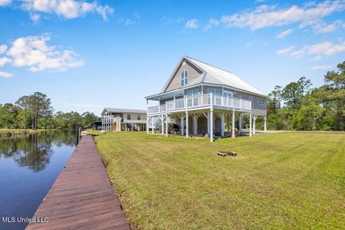 Located on a spacious waterfront lot in Bay St. Louis, this - photo 43