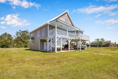 Located on a spacious waterfront lot in Bay St. Louis, this - photo 44