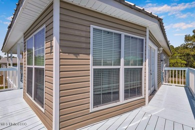 Located on a spacious waterfront lot in Bay St. Louis, this - photo 45