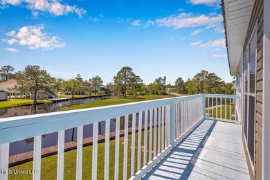 Located on a spacious waterfront lot in Bay St. Louis, this - photo 46