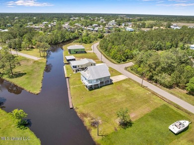 Located on a spacious waterfront lot in Bay St. Louis, this - photo 47