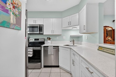 This beautifully updated 2 bedroom, 1 bath condo offers the - photo 2