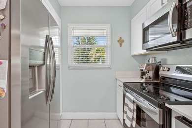 This beautifully updated 2 bedroom, 1 bath condo offers the - photo 3