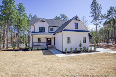 (private lake, pond, creek) Home Sale Pending in Whispering Pines North Carolina