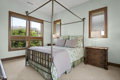 This is a beautifully maintained four-bedroom, five-bathroom