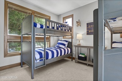 This is a beautifully maintained four-bedroom, five-bathroom